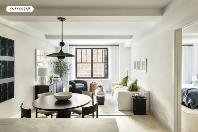 a black and white photo of a living room