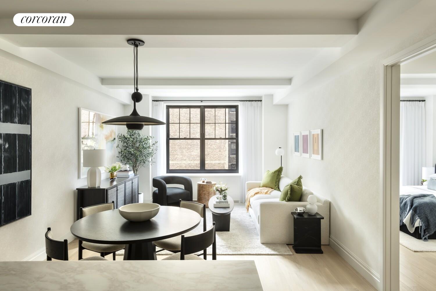 a living room with furniture and a table