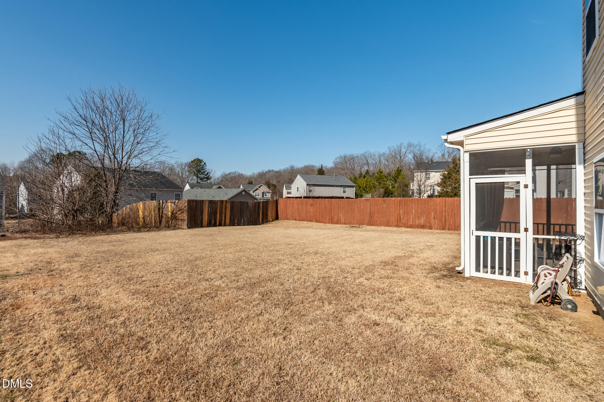 2019 Tennessee Road Durham, NC 27704 - Photo 7 of 28 a view of a house with backyard and trees