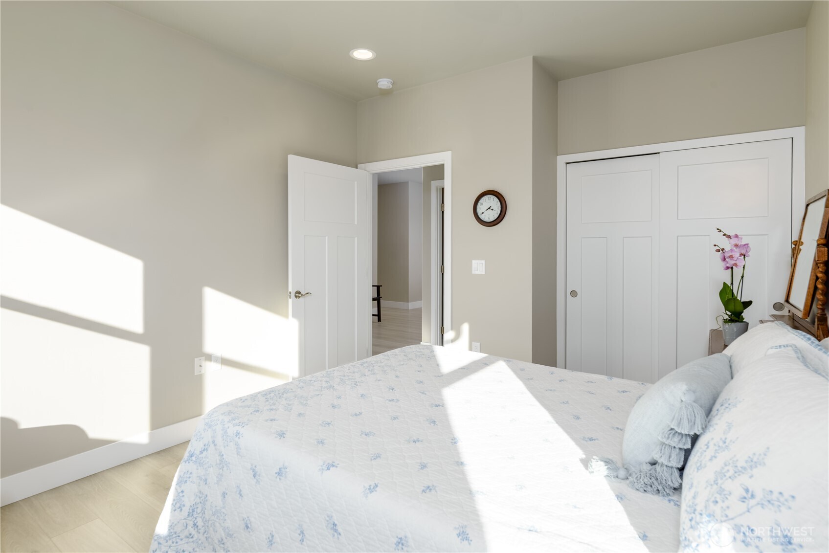 621 Jones Farm Road Sequim, WA 98382 - Photo 32 of 40 a bedroom with a bed and a large window