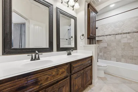 a view of a park with swings and slides