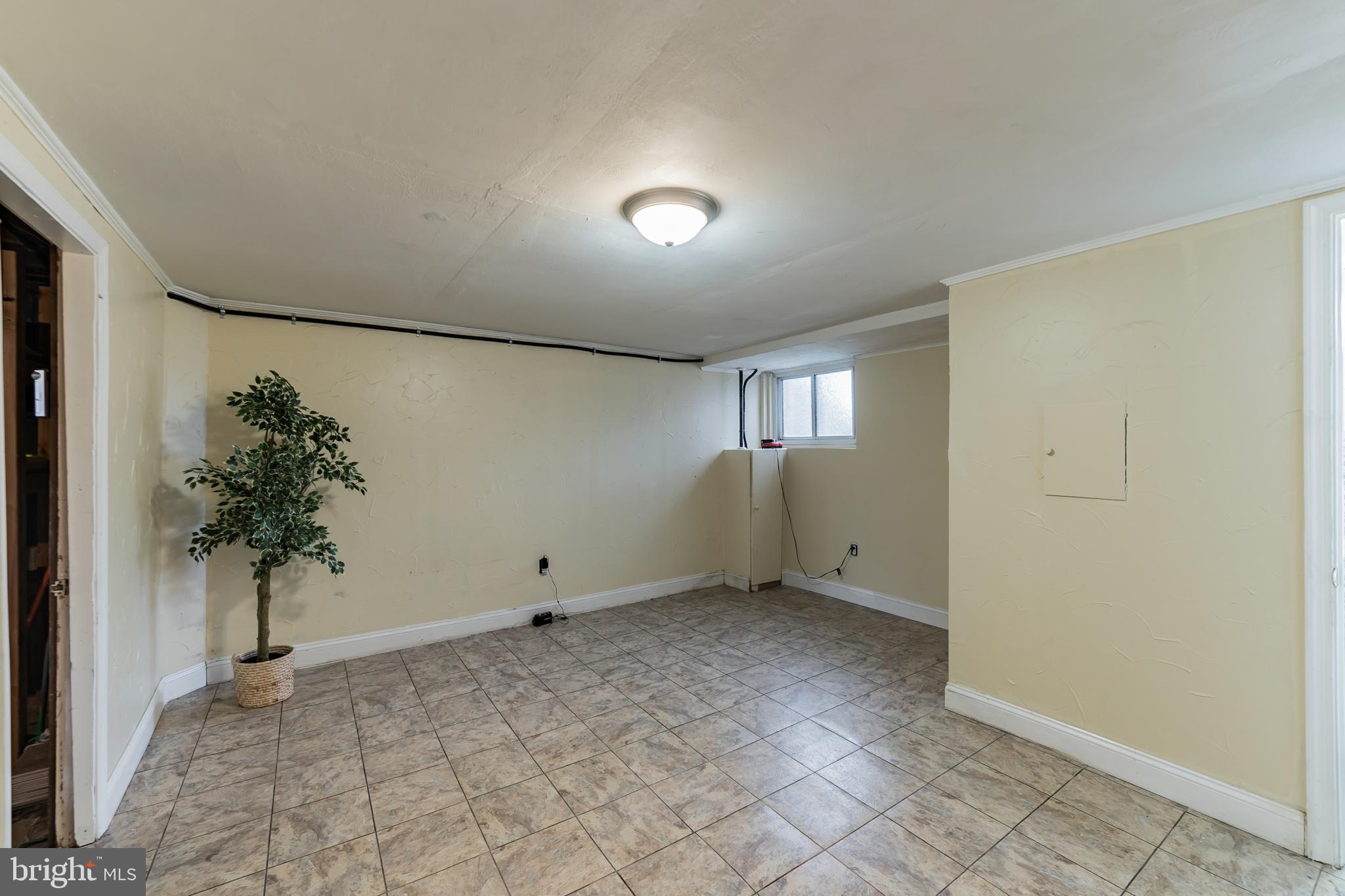 315 Westshire Road Baltimore, MD 21229 - Photo 15 of 25 Finished basement room with sunlight
