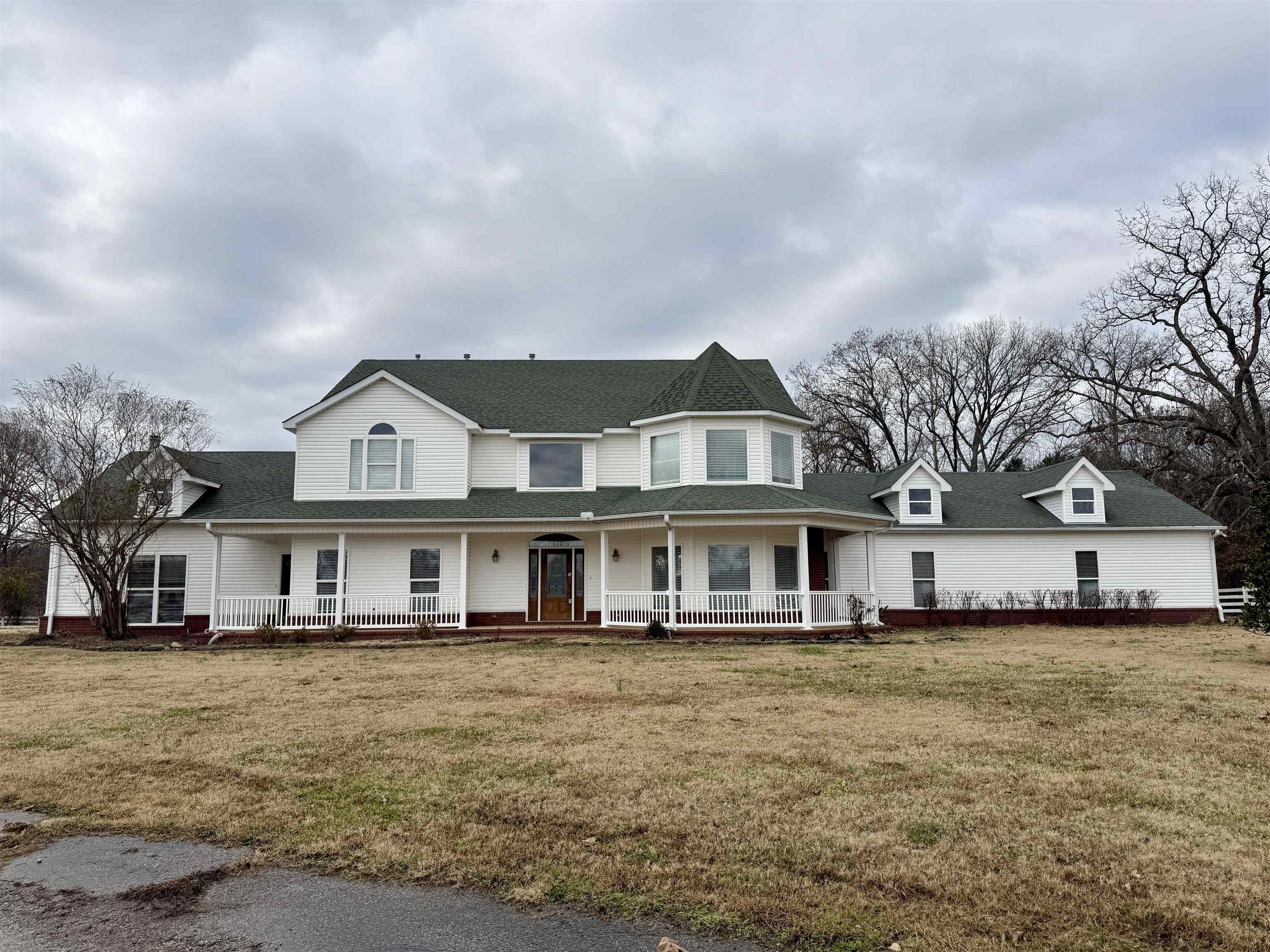 200 Diffee Road Moscow, TN 38057 - Photo 2 of 33 View of front of house featuring a porch and a front lawn