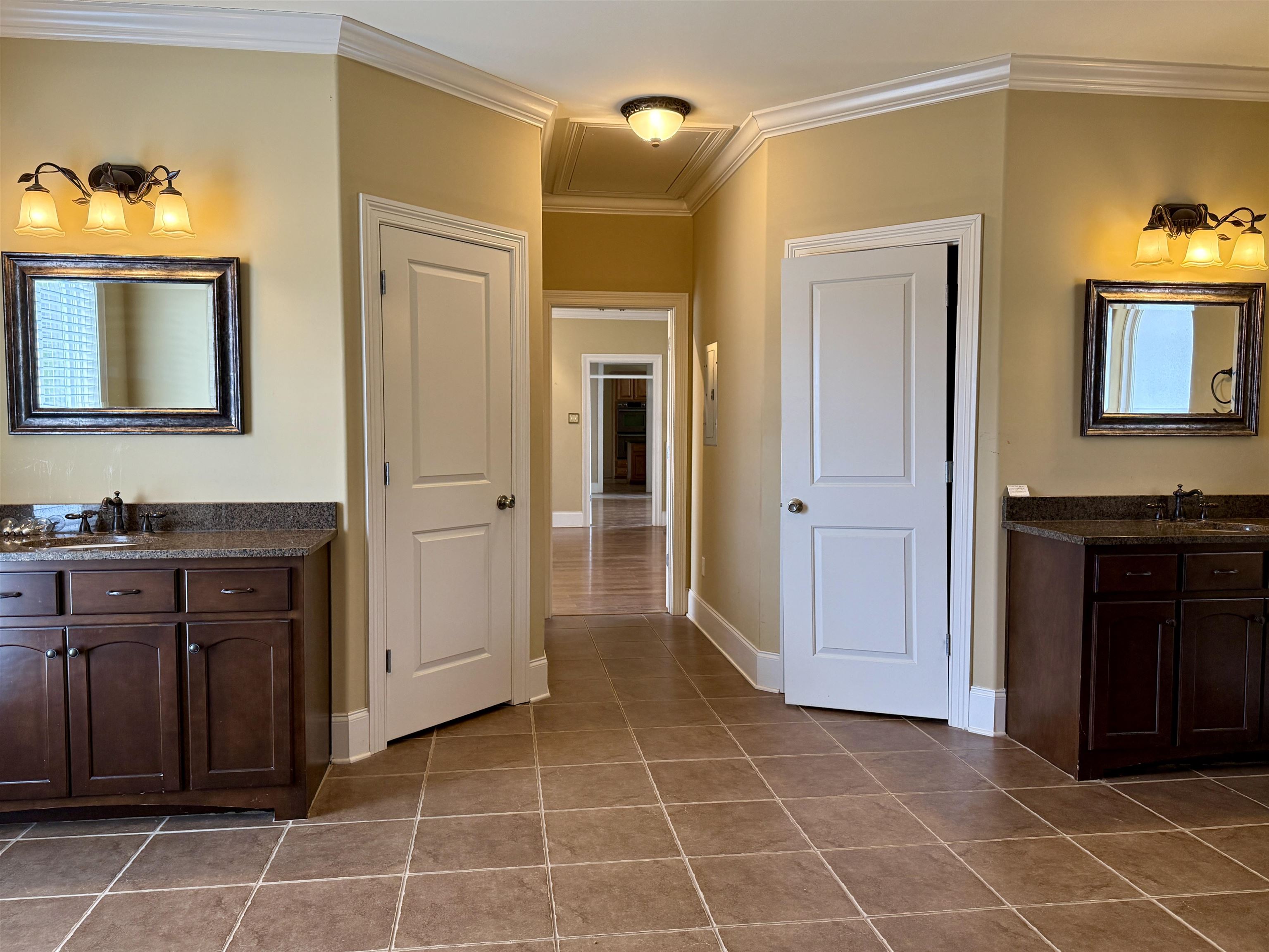 200 Diffee Road Moscow, TN 38057 - Photo 24 of 33 Bathroom with ornamental molding, tile patterned flooring, and vanity
