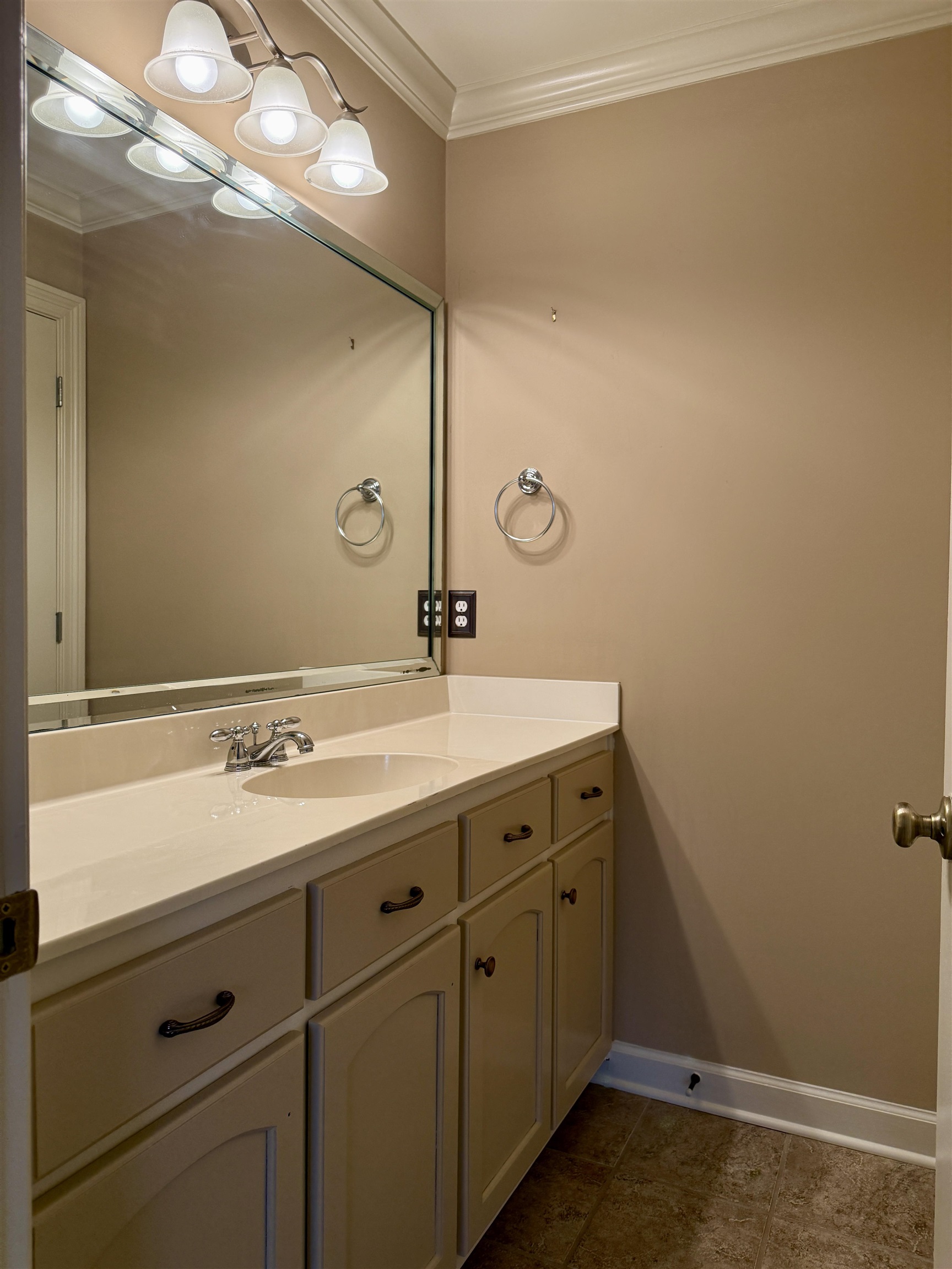200 Diffee Road Moscow, TN 38057 - Photo 30 of 33 Bathroom featuring vanity, crown molding, and tile patterned floors