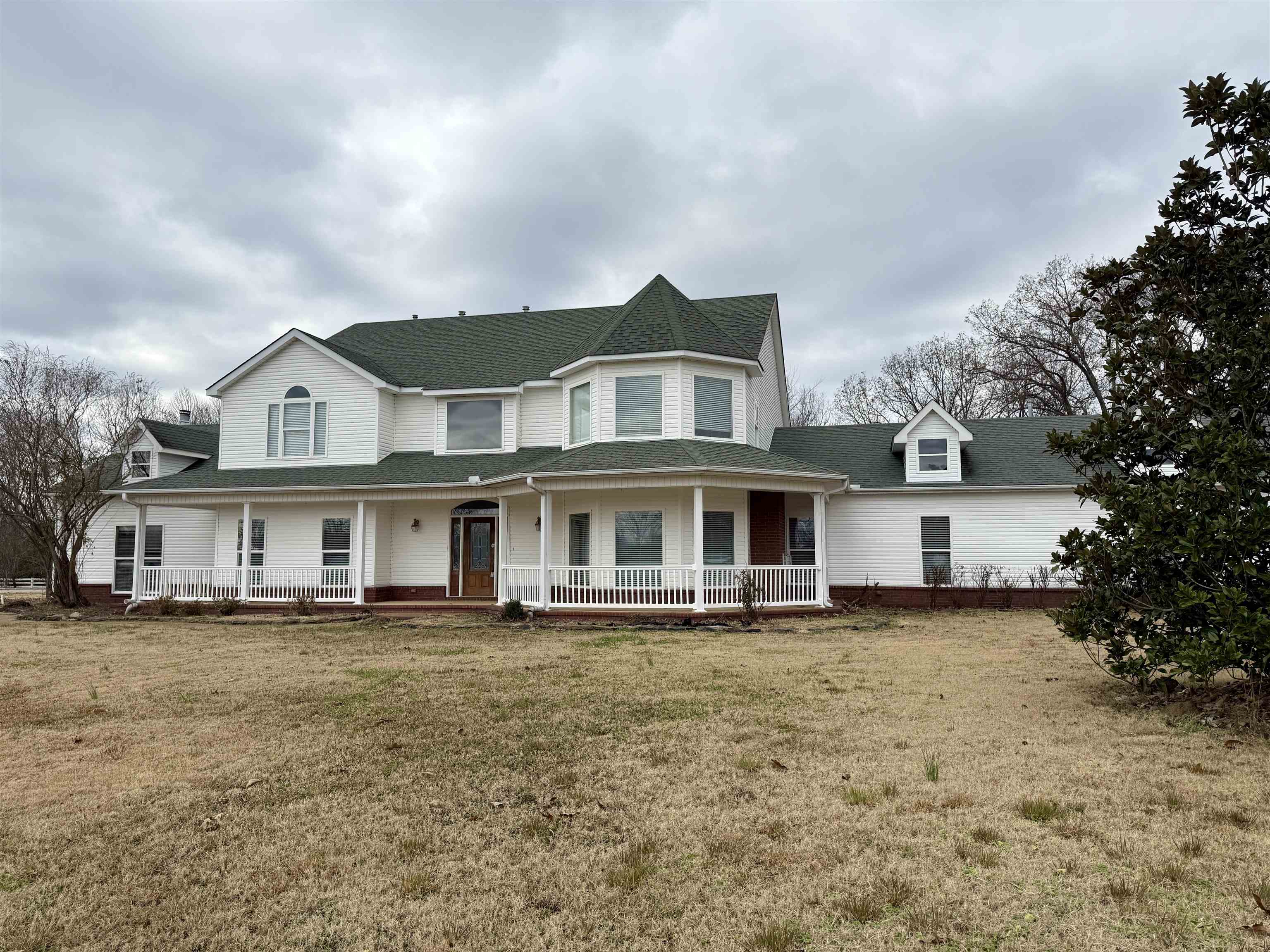 200 Diffee Road Moscow, TN 38057 - Photo 3 of 33 View of front of property with a front lawn and a porch