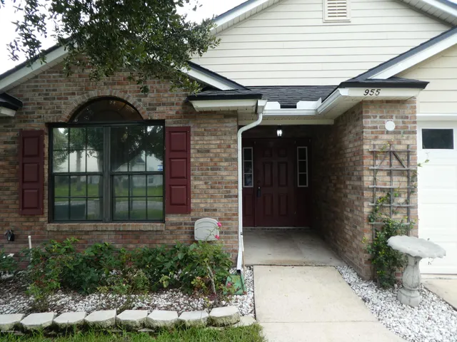 a front view of a house with a porch