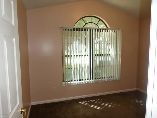 a bathroom with a sink a mirror and shower