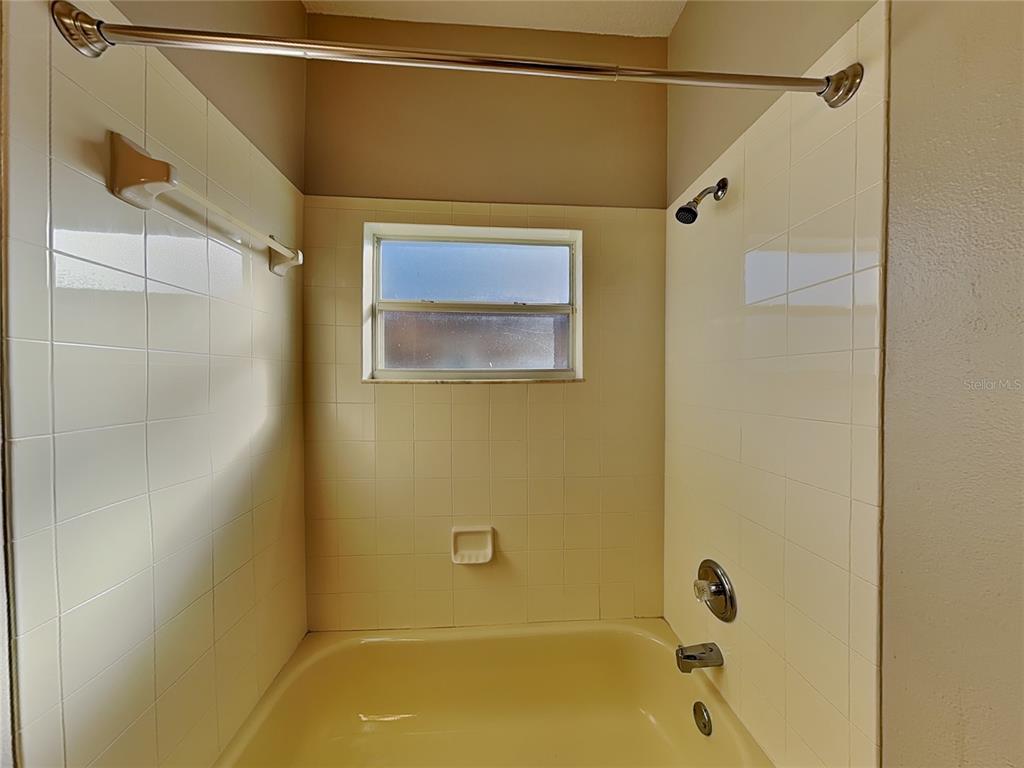 Undisclosed Address Land O' Lakes, FL 34639 - Photo 21 of 25 a bathroom with a shower