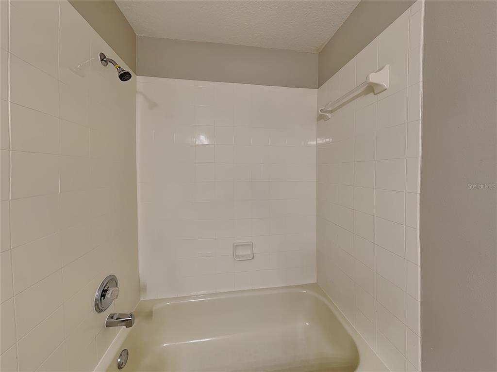 Undisclosed Address Land O' Lakes, FL 34639 - Photo 23 of 25 a bathroom with a bathtub