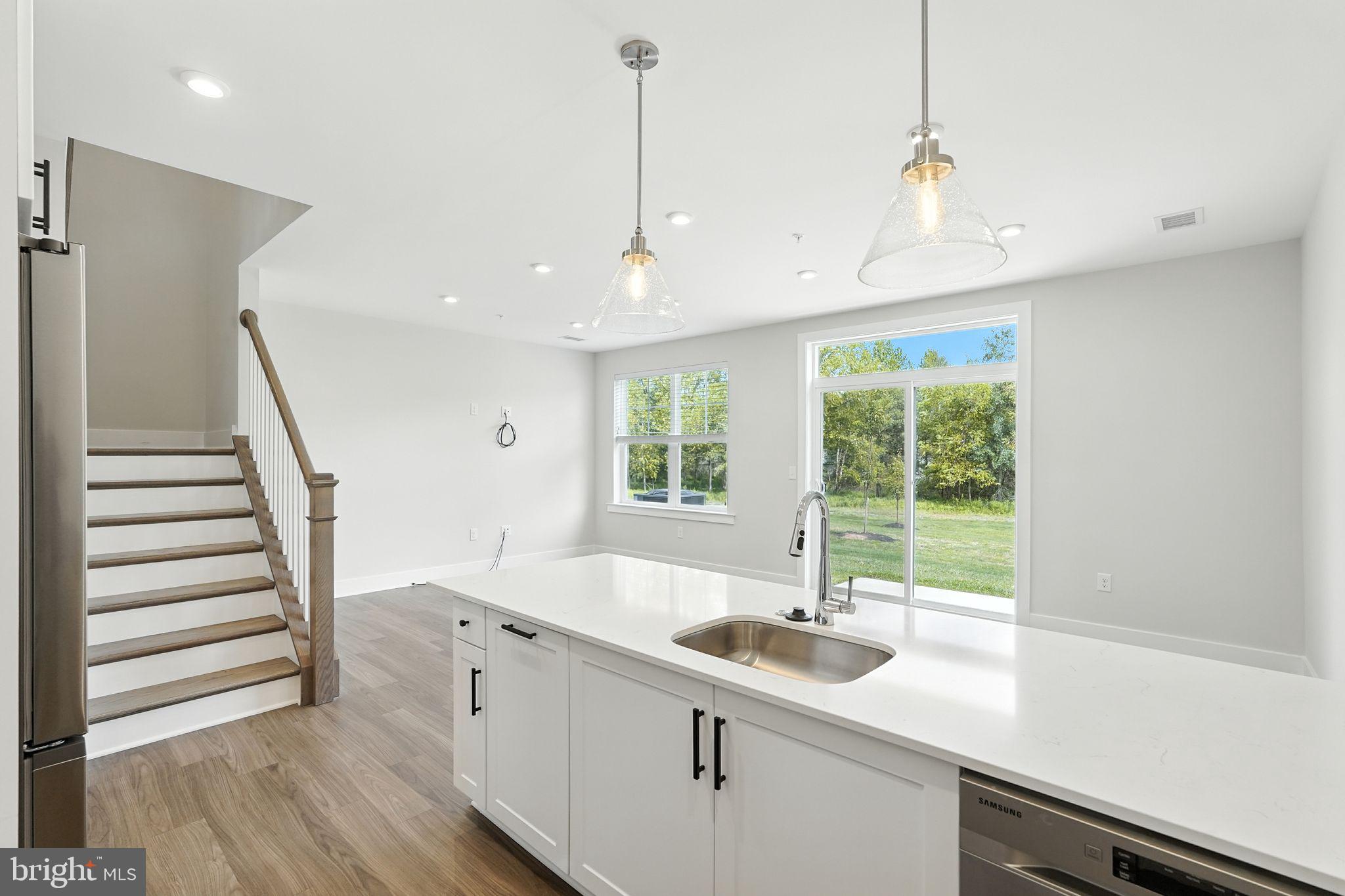 17 Mainland Road, Unit 115 Harleysville, PA 19438 - Photo 7 of 15 a kitchen with sink and window
