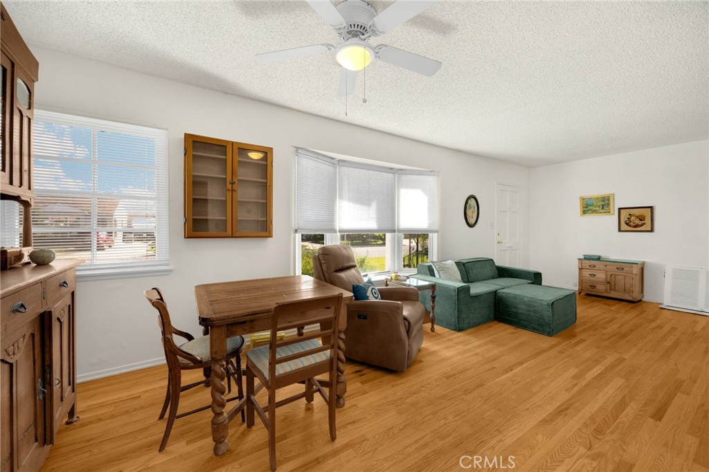 4577 Ranger Avenue El Monte, CA 91731 - Photo 10 of 25 a view of a dining room with furniture window and wooden floor