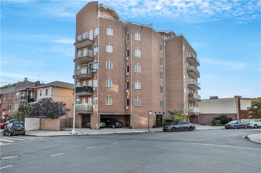 a tall building sitting on the side of a street