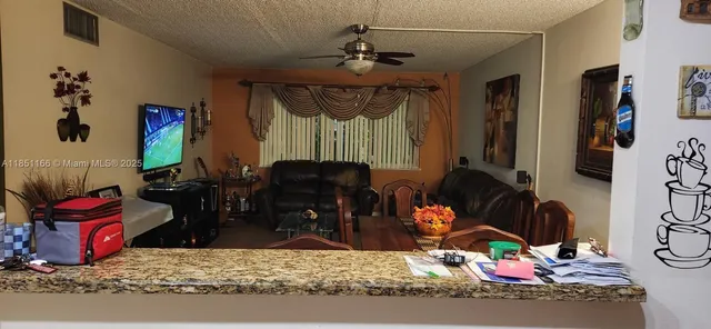 a room with lots of different colored cloths