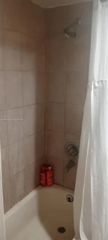 a bathroom with a sink and toilet