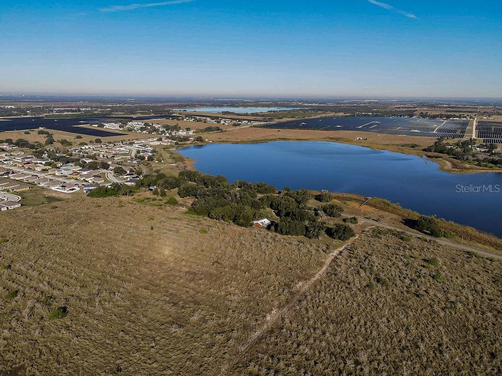 336 Lake Mabel Loop Road Lake Wales, FL 33898 - Photo 53 of 60 a view of an ocean and beach