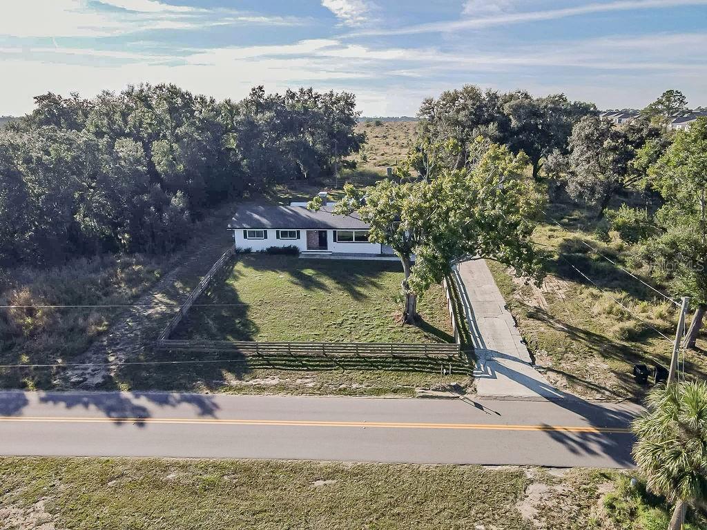 336 Lake Mabel Loop Road Lake Wales, FL 33898 - Photo 57 of 60 a view of a water with a mountain