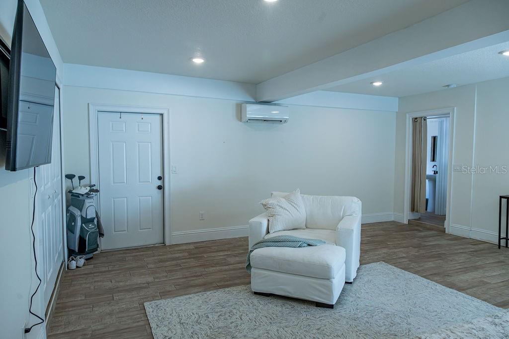 336 Lake Mabel Loop Road Lake Wales, FL 33898 - Photo 7 of 60 a living room with furniture and a rug