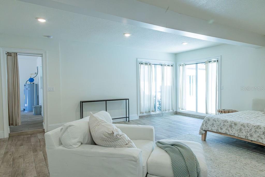 336 Lake Mabel Loop Road Lake Wales, FL 33898 - Photo 10 of 60 a bedroom with a bed and window