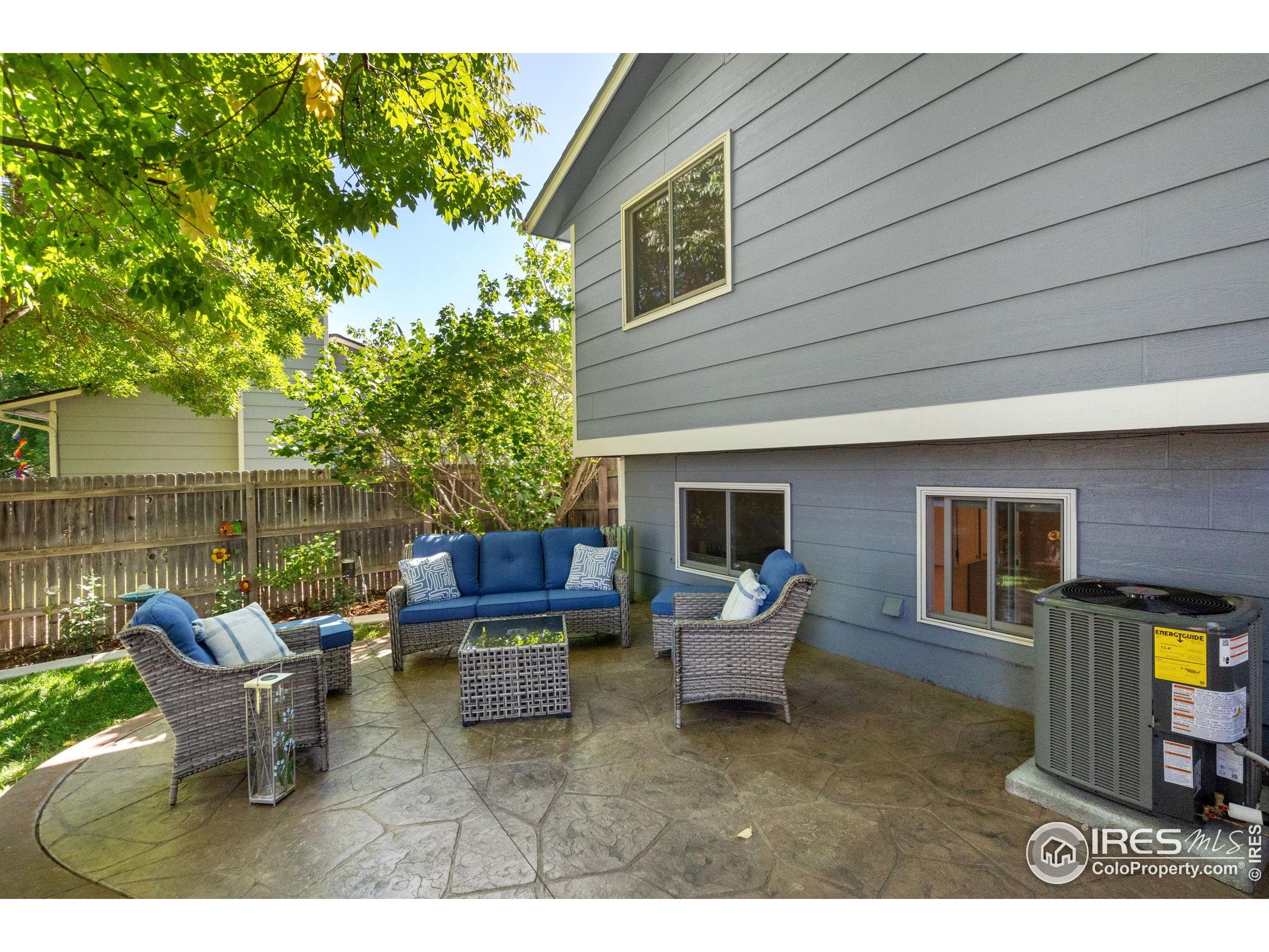 2500 Wapiti Road Fort Collins, CO 80525 - Photo 28 of 34 a backyard of a house with seating space