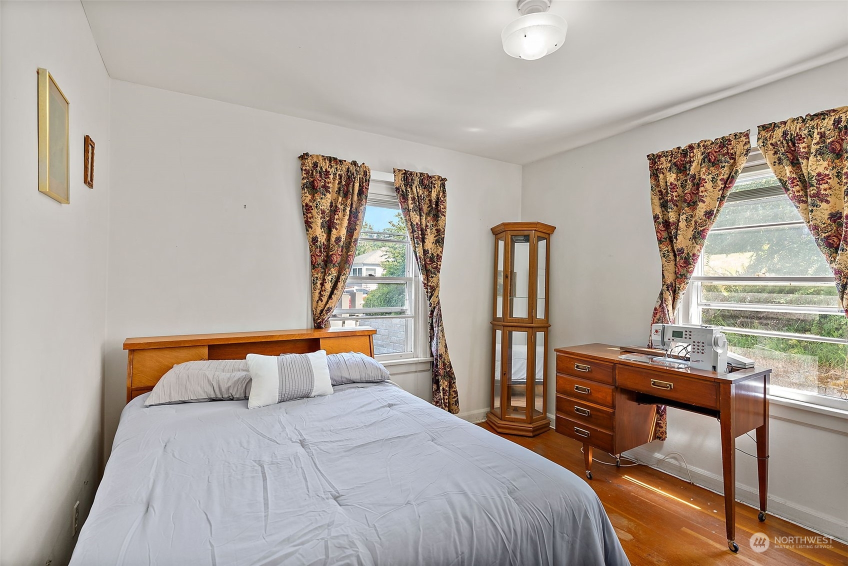 1405 Morris Avenue South Renton, WA 98055 - Photo 13 of 27 a bedroom with furniture and window