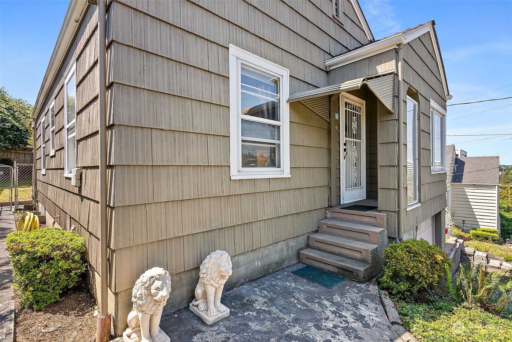 1405 Morris Avenue South Renton, WA 98055 - Photo 18 of 27 a backyard of a house with outdoor seating
