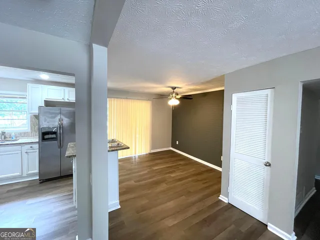 a view of an empty room and window