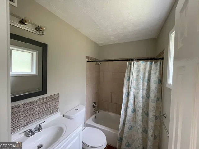 en view of an empty room with a window