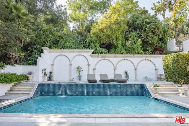 a view of a yard with open kitchen