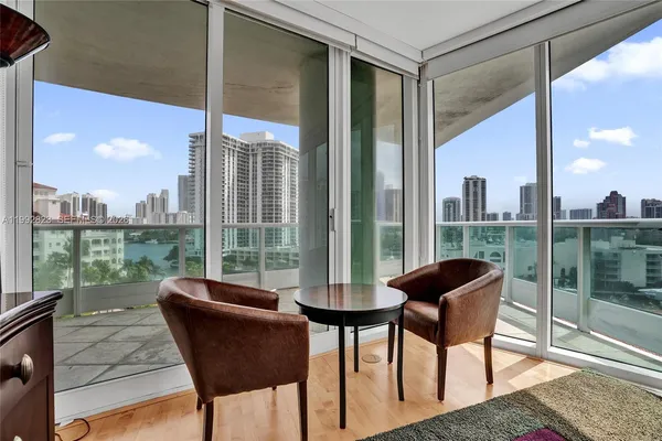 a spacious bathroom with a tub sink and mirror