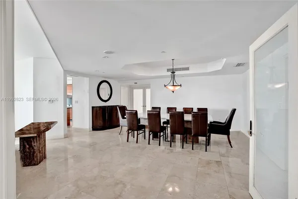 a view of a dining room with furniture