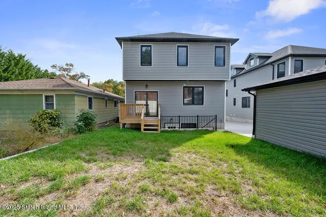 a house view with a garden space