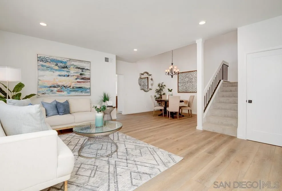721 Summersong Lane Encinitas, CA 92024 - Photo 2 of 29 a living room with furniture and wooden floor