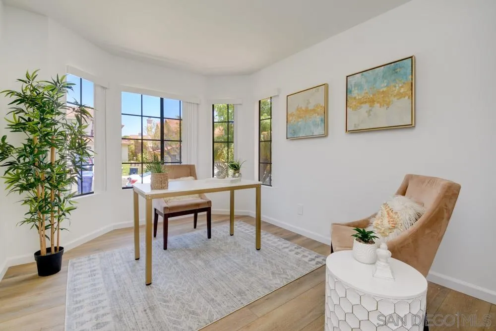 721 Summersong Lane Encinitas, CA 92024 - Photo 24 of 29 a view of a livingroom with furniture and a potted plant
