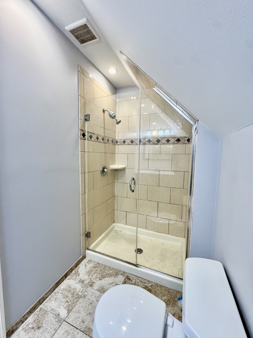 28 Batavia Road Warrenville, IL 60555 - Photo 13 of 17 a bathroom with a granite countertop bathtub shower and toilet