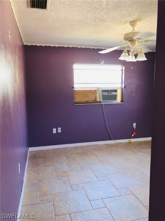 2701 W Road Fort Myers, FL 33905 - Photo 26 of 50 a view of an empty room with a chandelier fan