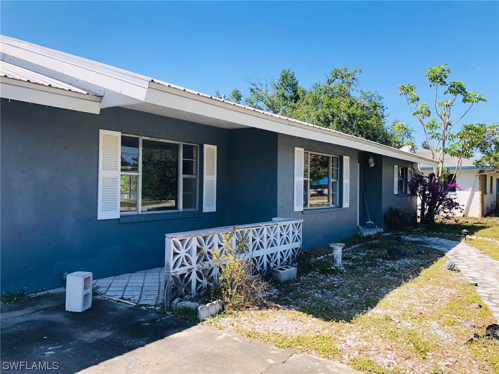 2701 W Road Fort Myers, FL 33905 - Photo 3 of 50 a front view of a house