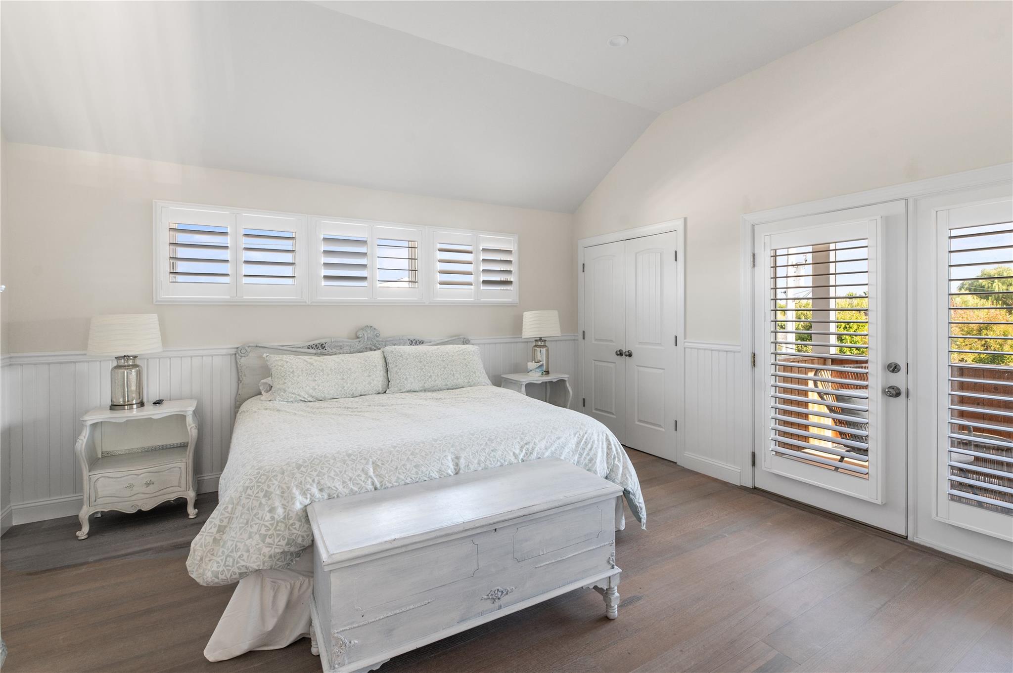 338 Surf Road Ocean Beach, NY 11770 - Photo 4 of 12 a spacious bedroom with a bed and wooden floor