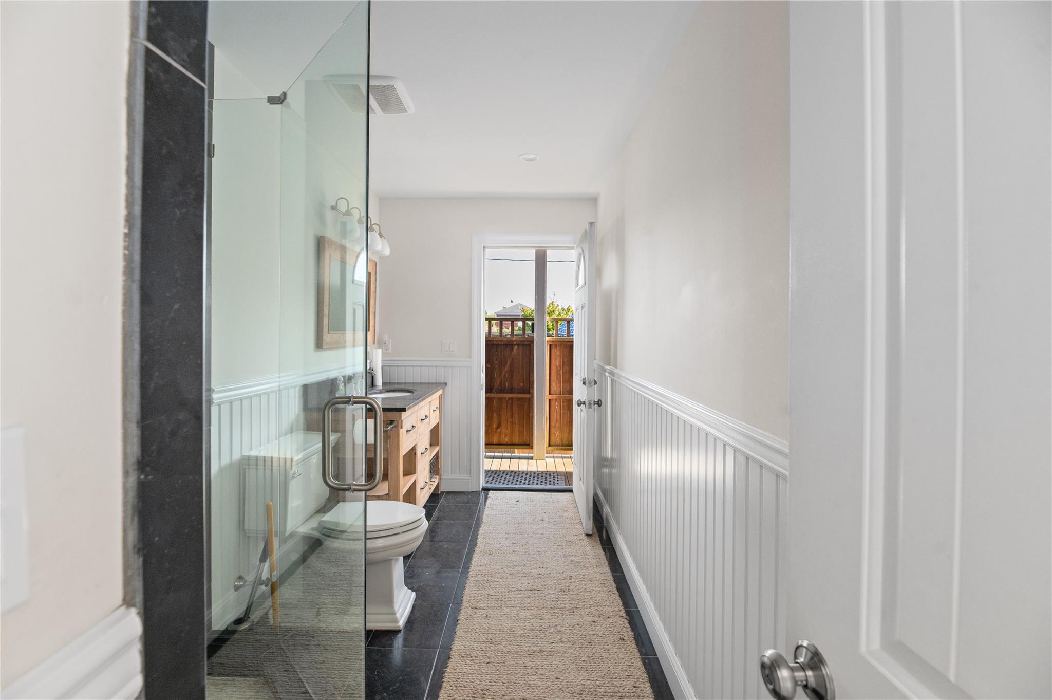 338 Surf Road Ocean Beach, NY 11770 - Photo 6 of 12 a view of hallway with chandelier