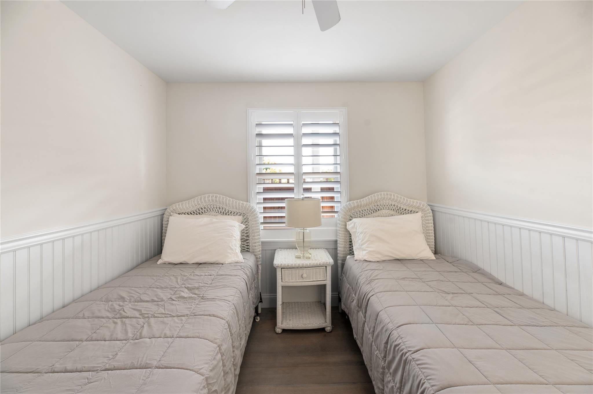 338 Surf Road Ocean Beach, NY 11770 - Photo 7 of 12 a bedroom with a bed and a window