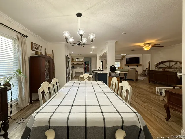 a kitchen with cabinets and stainless steel appliances