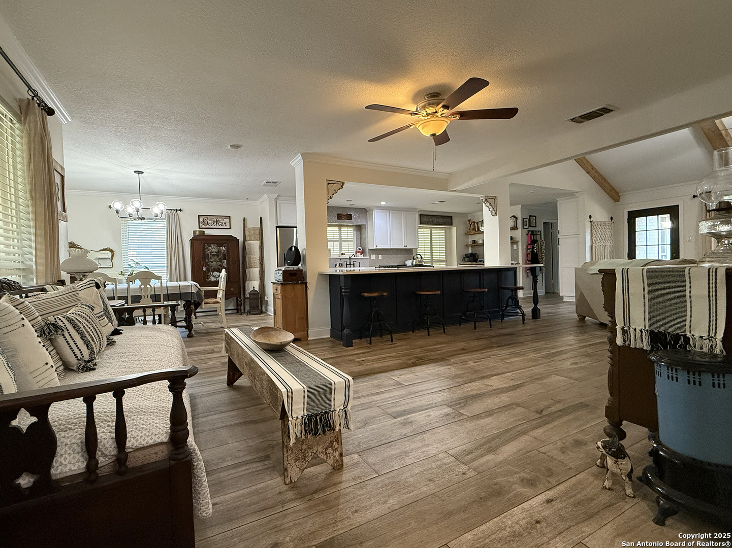 12518 Chateau Forest Lane San Antonio, TX 78230 - Photo 30 of 37 a view of a dining room with furniture a rug and wooden floor