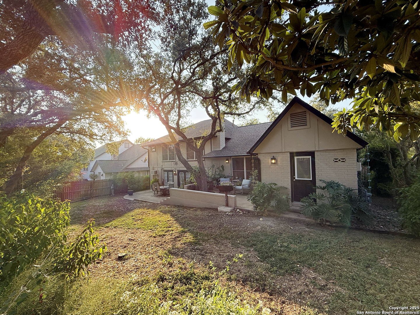 12518 Chateau Forest Lane San Antonio, TX 78230 - Photo 4 of 37 a front view of house with yard and trees around