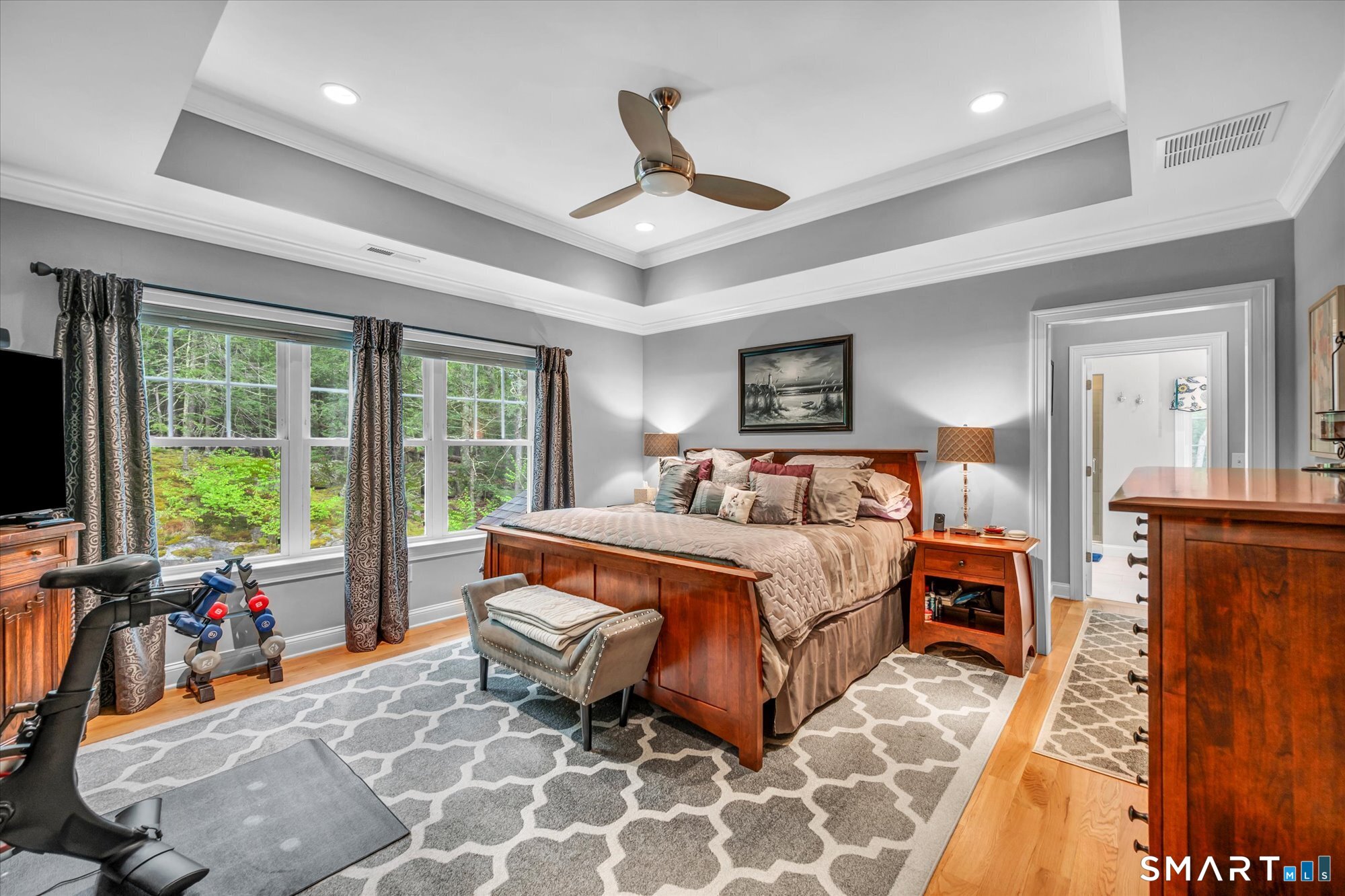 16 Sweetheart Mountain Road Canton, CT 06019 - Photo 29 of 40 a bedroom with furniture and a flat screen tv