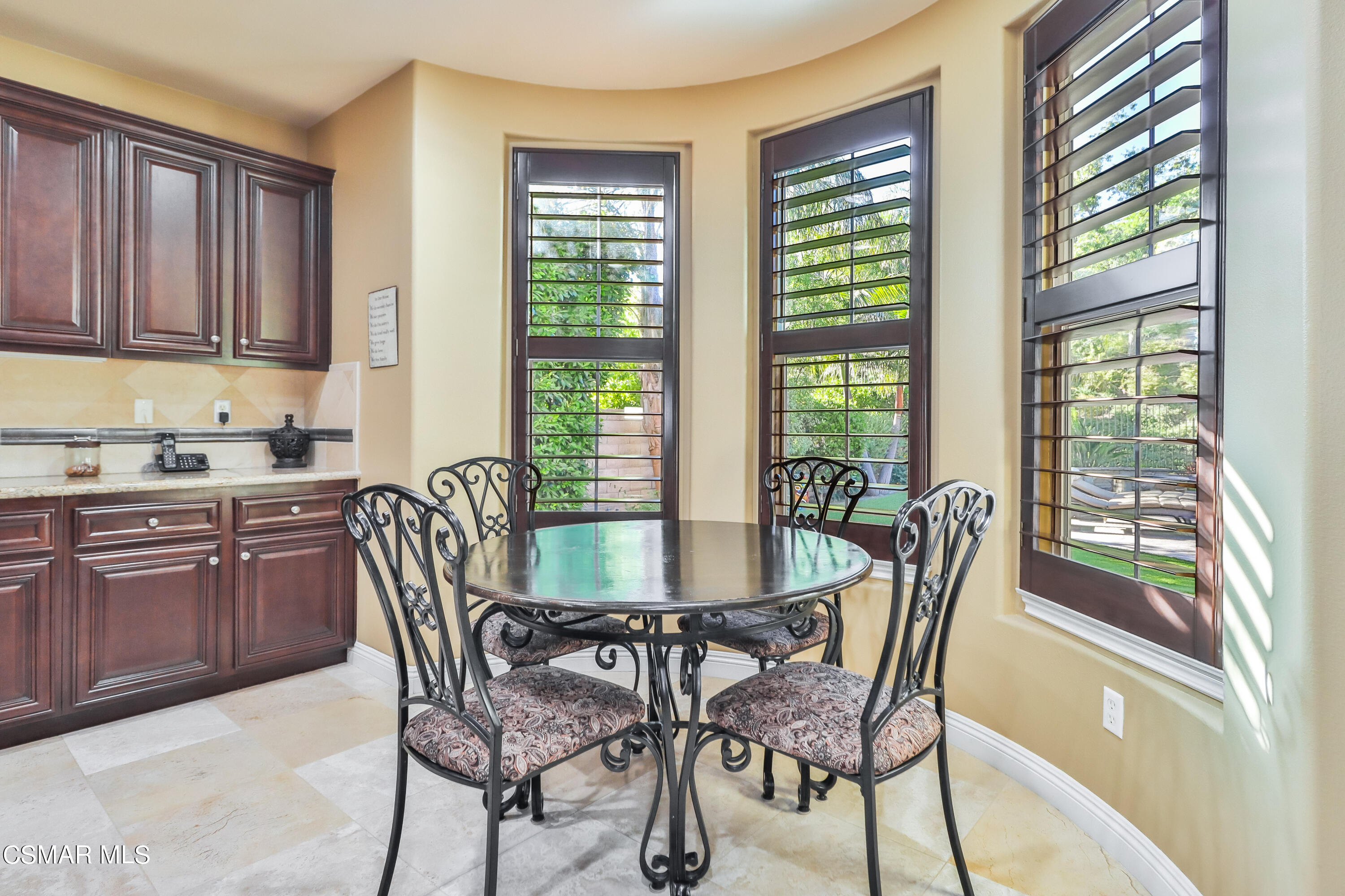 4025 Eagle Flight Drive Simi Valley, CA 93065 - Photo 16 of 60 a view of a dining room with furniture a livingroom and wooden floor