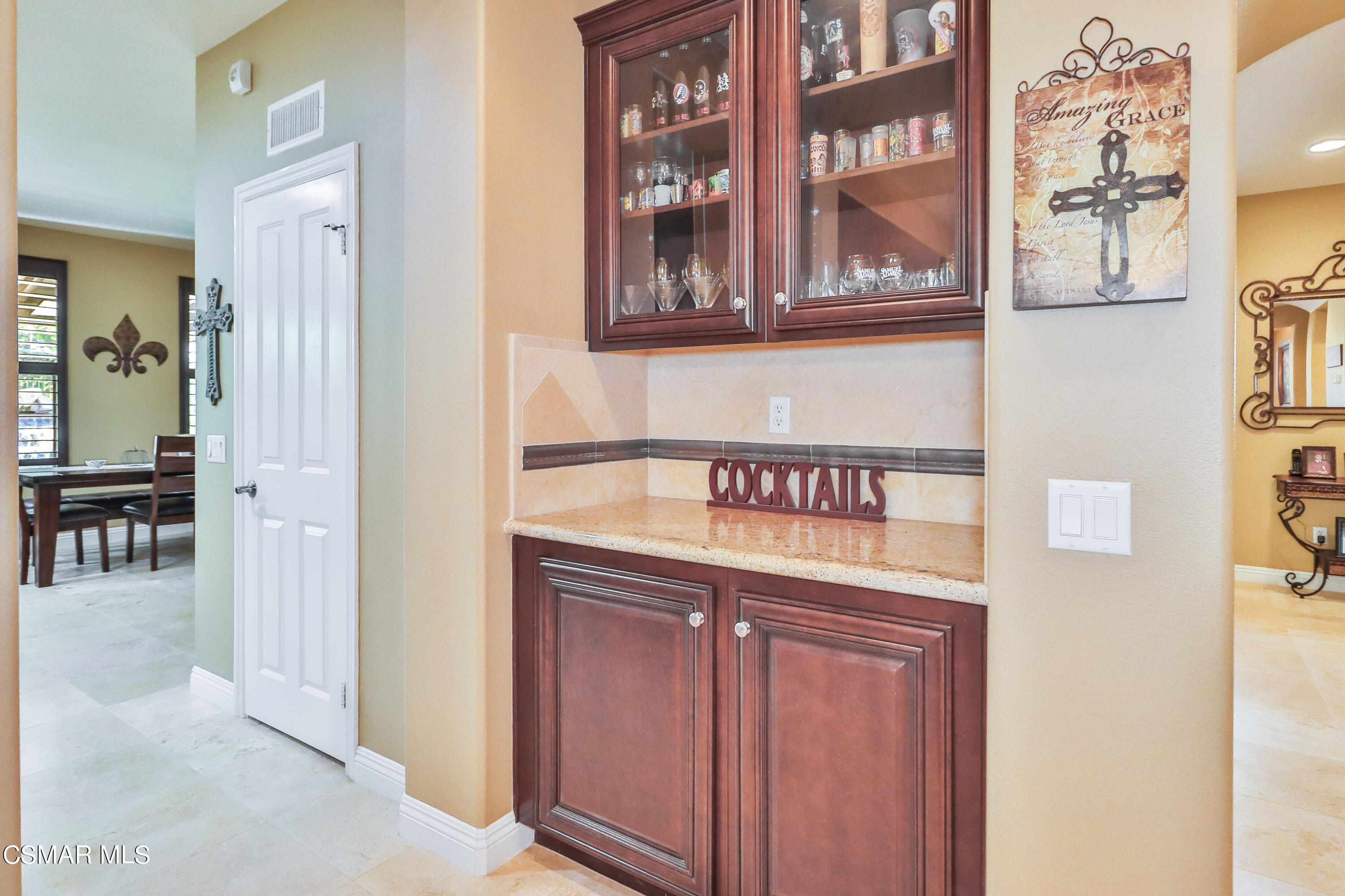 4025 Eagle Flight Drive Simi Valley, CA 93065 - Photo 25 of 60 a view of a kitchen with stainless steel appliances granite countertop a refrigerator and a stove with wooden floor