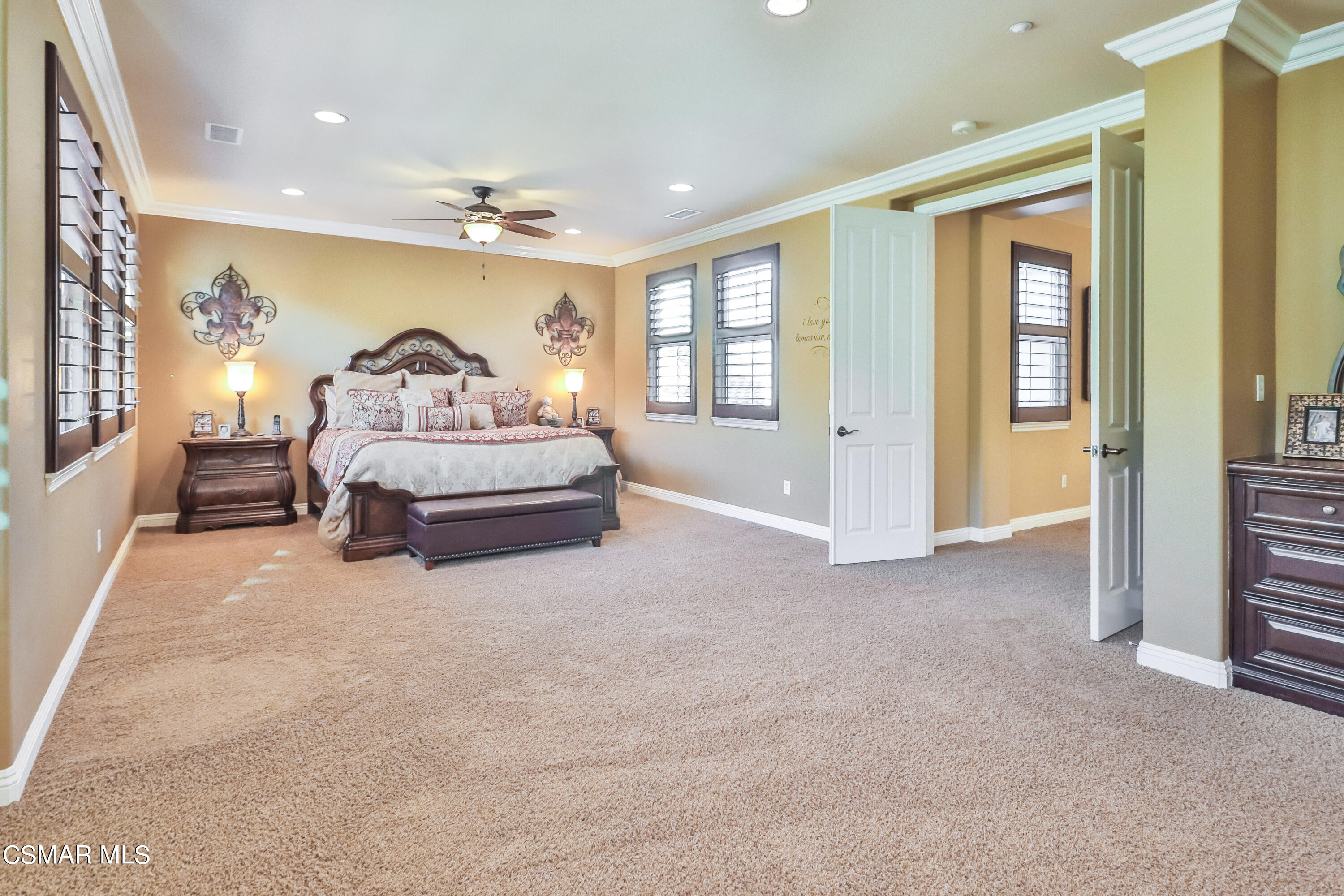 4025 Eagle Flight Drive Simi Valley, CA 93065 - Photo 34 of 60 a spacious bedroom with a bed and a couch