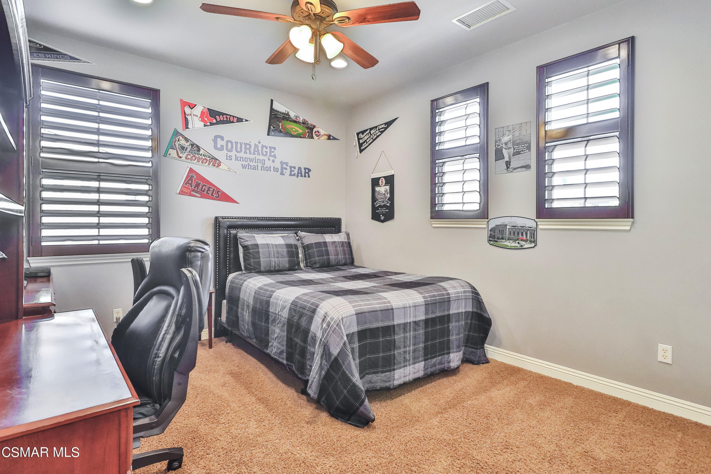 4025 Eagle Flight Drive Simi Valley, CA 93065 - Photo 38 of 60 a bedroom with a bed and a chandelier