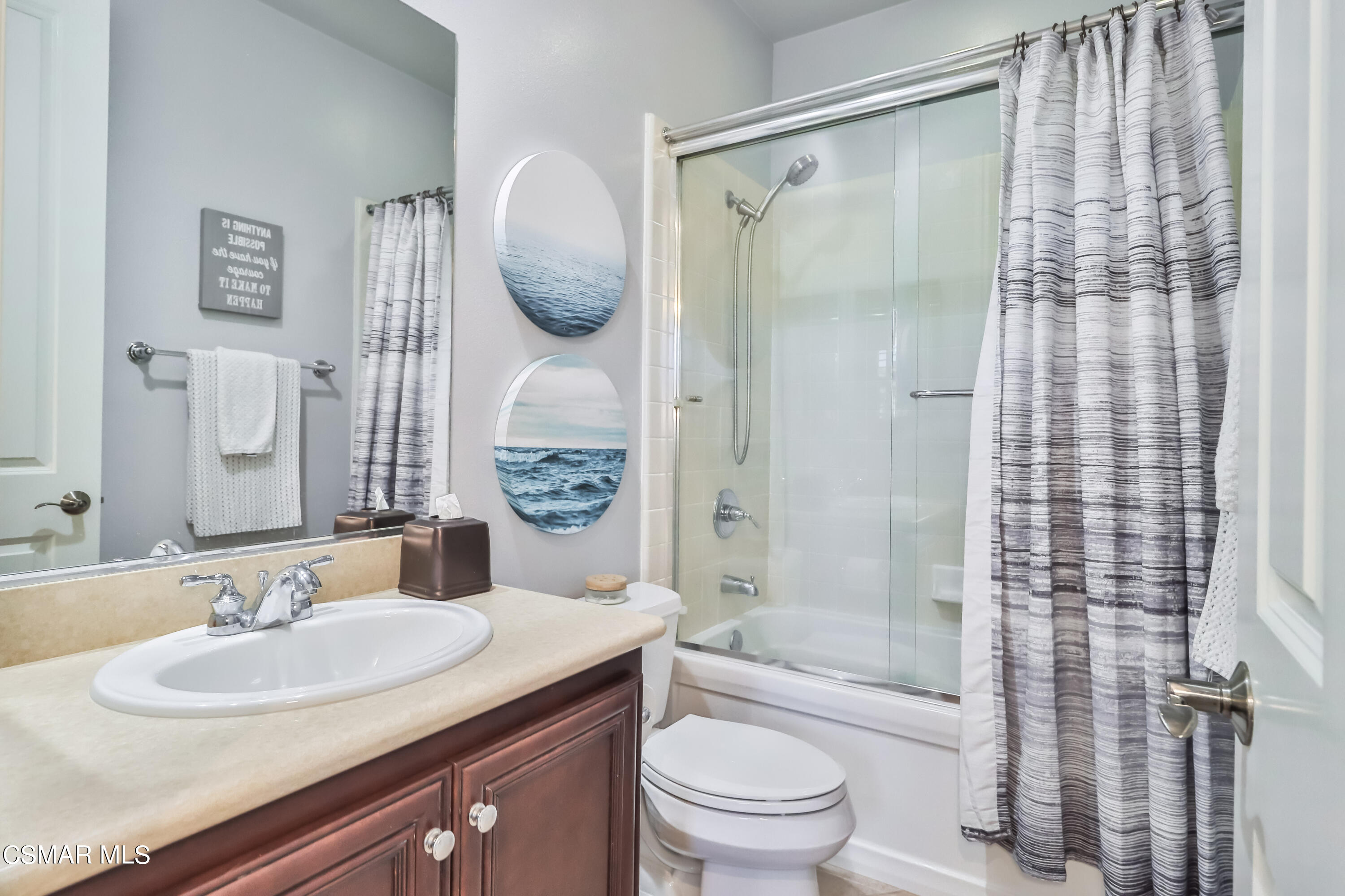 4025 Eagle Flight Drive Simi Valley, CA 93065 - Photo 39 of 60 a bathroom with a sink toilet a mirror and shower