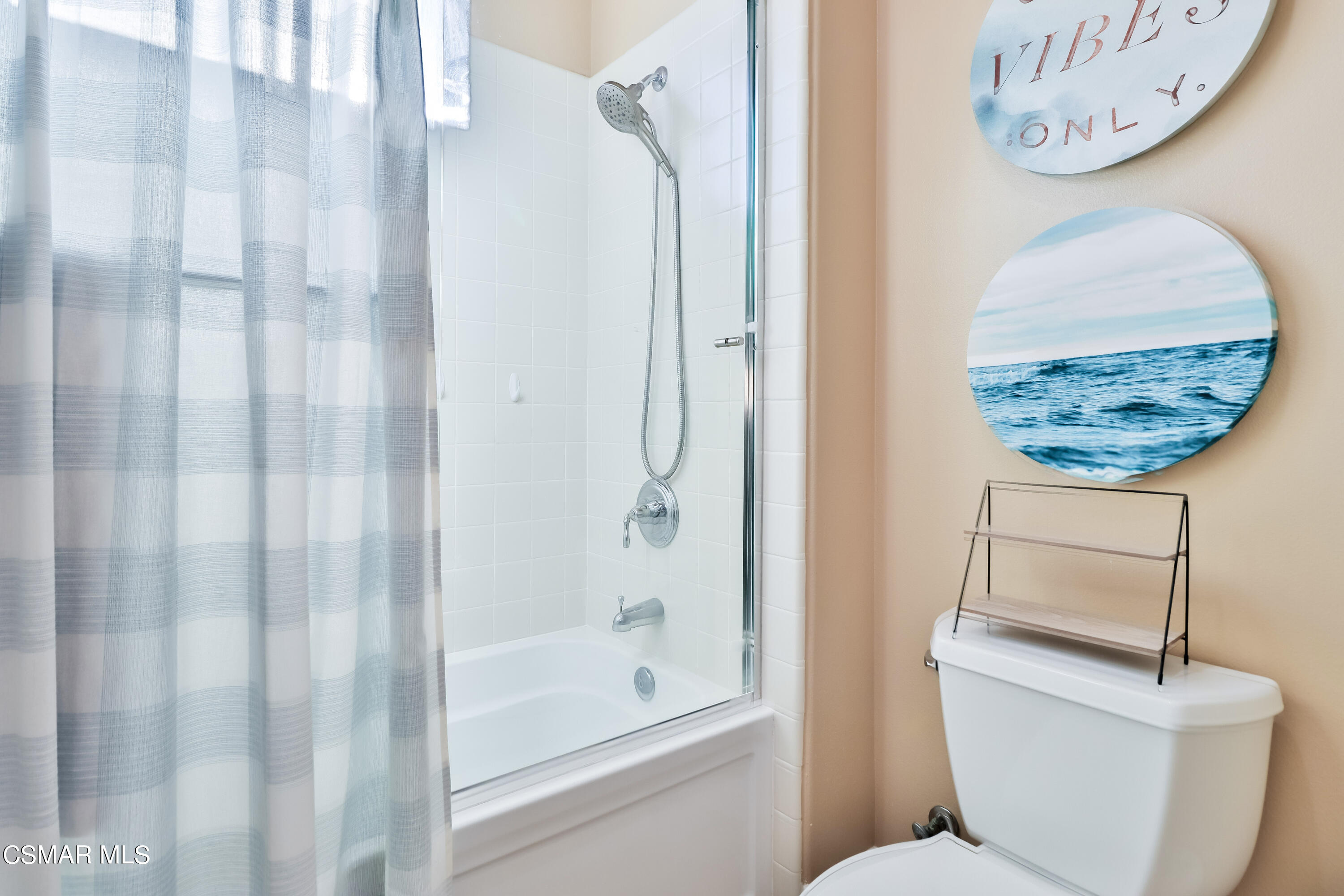 4025 Eagle Flight Drive Simi Valley, CA 93065 - Photo 43 of 60 a bathroom with a granite countertop sink a toilet and shower